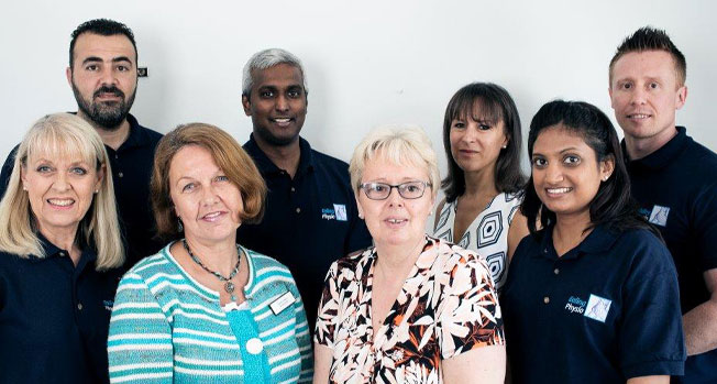 Wide shot of Ealing physio team.