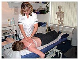 Client receiving back treatment